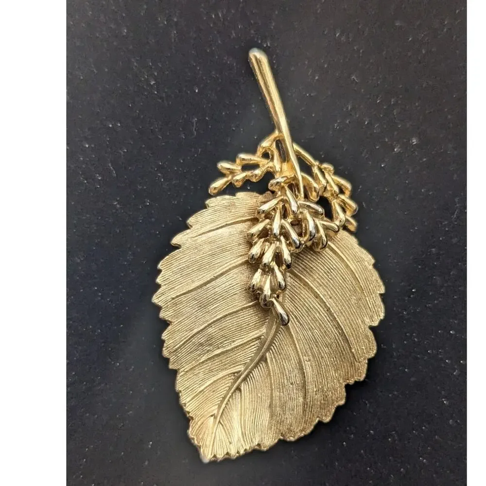 BSK Gold tone leaf brooch pin mid century elegant by Steinberg slovitt and kasko